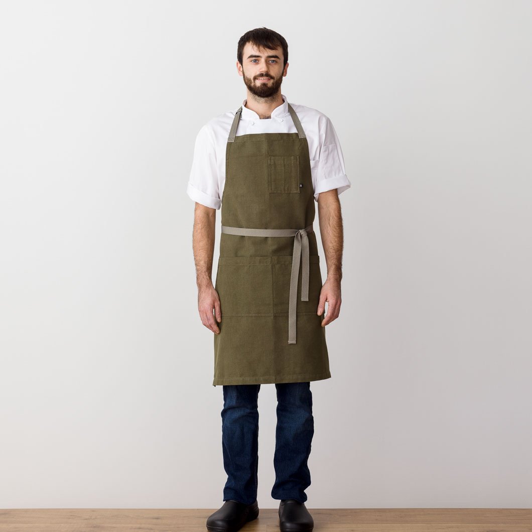 Chef's Apron, Olive Green with Tan Straps, Men or Women, model front view-The Reluctant Trading Experiment